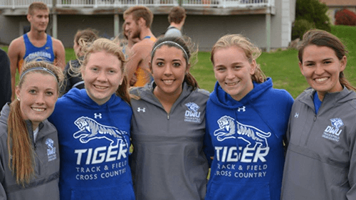 McKenna Rogers, second from right, with her cross country and track teammates.